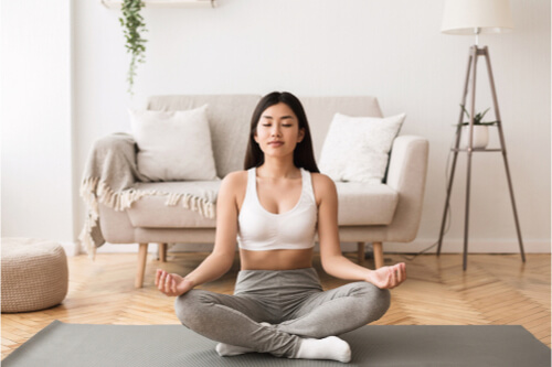 Stressed Out In Isolation? Here's How To Unwind yoga